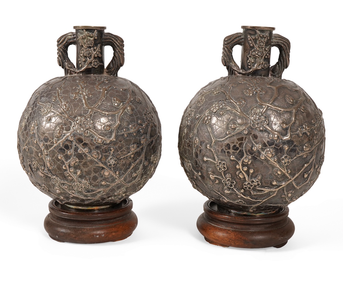 A pair of late 19th/early 20th century Chinese Export white metal two handled globular vases, by Wang Hing, Hong Kong